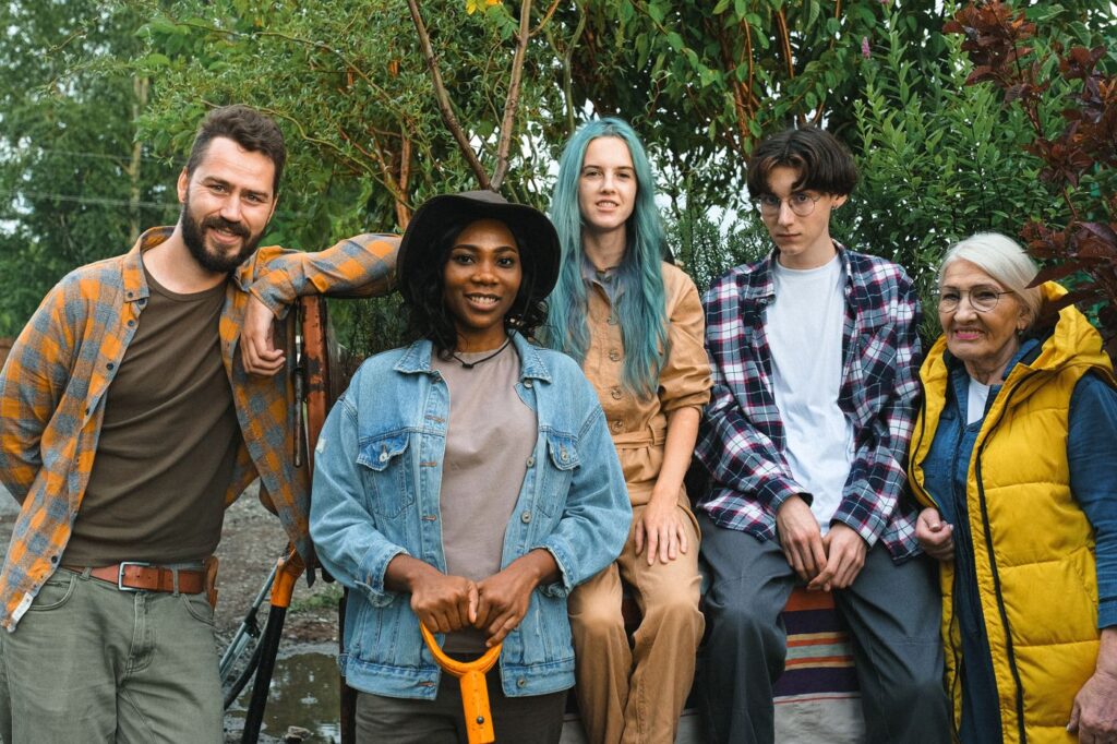 A diverse group of friends smiling together outdoors